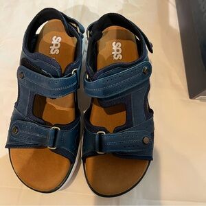 Brand new SAS Navy blue Embark Sport sandals. Size 9M